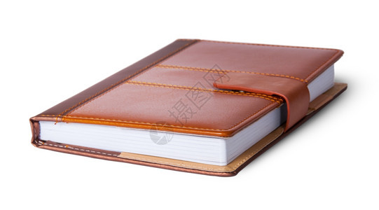 白色背景上隔离的皮革封面闭笔记本新的棕色钱包图片
