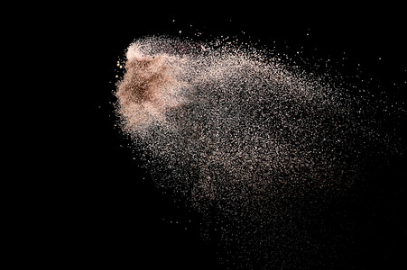 黑色的abstractsandcloudgoldencolouredsplashagainstdarkbackground