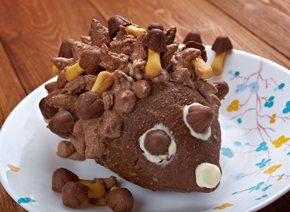 儿童可口巧克力蛋糕儿童食品刺猬孩子们的燃烧背景图片