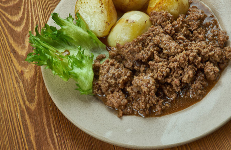 地面百万bof丹麦配土豆的牛肉盘扒剁碎图片