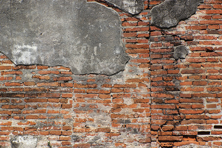 旧的破碎砖墙作为背景或纹理作为背景具体的岩石堵塞图片