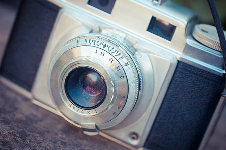 镜片技术目的用模拟胶片制作的古老照相机美丽设计背景图片