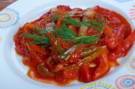 苦的tchektchouka马格勒布西红柿和铃椒及辣地中海东方的图片