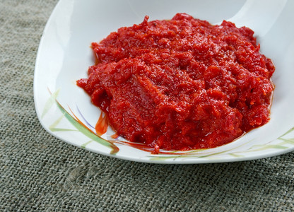 三菜热的红咖喱辣椒糊crmzbibersalcas土耳其菜辛辣的粘贴背景