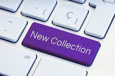 键盘紫色计算机上的新收藏词组邮政互联网图片