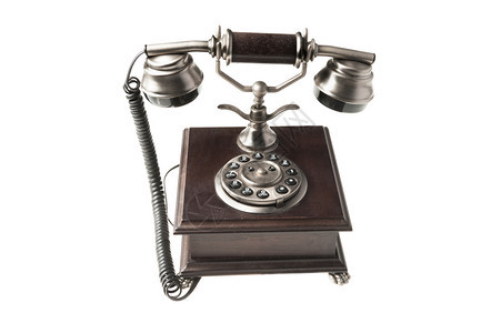 复古的白色背景上孤立的旧式办公用电话桌子图片