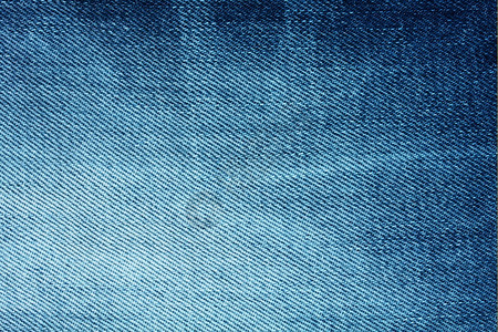 牛仔布材料深蓝的底色背景有条纹和缠绕粗糙的图片