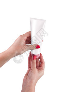 瓶子美丽手握奶油管在白色背景与剪切路径隔离包装图片