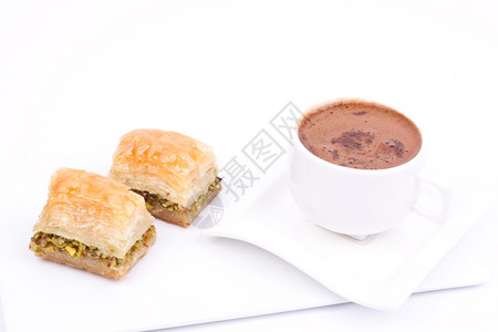 开心果仁蜜饼和咖啡巴卡拉面包店高清图片