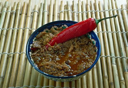 地牛关花絮小吃用猪肉和血制成的菲律宾杜努甘炖菜图片