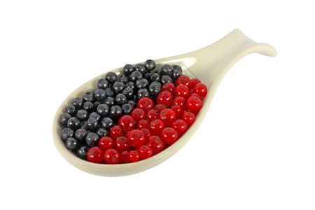 水果白色的多汁蓝莓和花草用白的孤立勺子图片