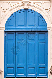 建造拱形的垃圾摇滚欧洲式房子折叠的蓝色木制门欧洲风格的房子图片