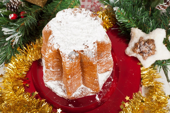 圣诞老人金子典型的意大利兰地潘多罗圣诞节日蛋糕甜的图片