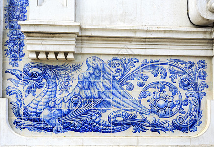 白色的细节装饰蓝色和白瓷砖板用作葡萄牙里斯本街头许多建筑物外墙的装饰用图案标牌传统的图片