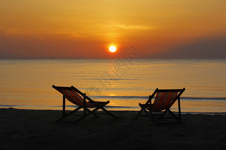 海滩日出背景图片