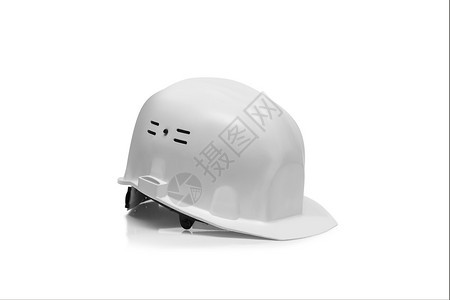 黄色的工具白背景上隔离的白色塑料安全头盔白色背景上隔离的绿色塑料安全头盔图片
