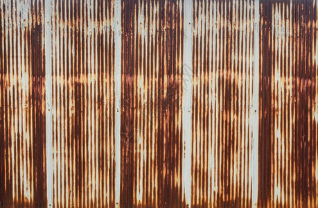 锈Rusty压制金属墙的栅栏图片