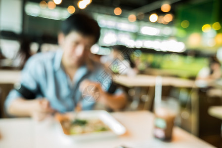 抽象模糊的餐厅或食品中心背景浅bokoh人们店铺散景图片