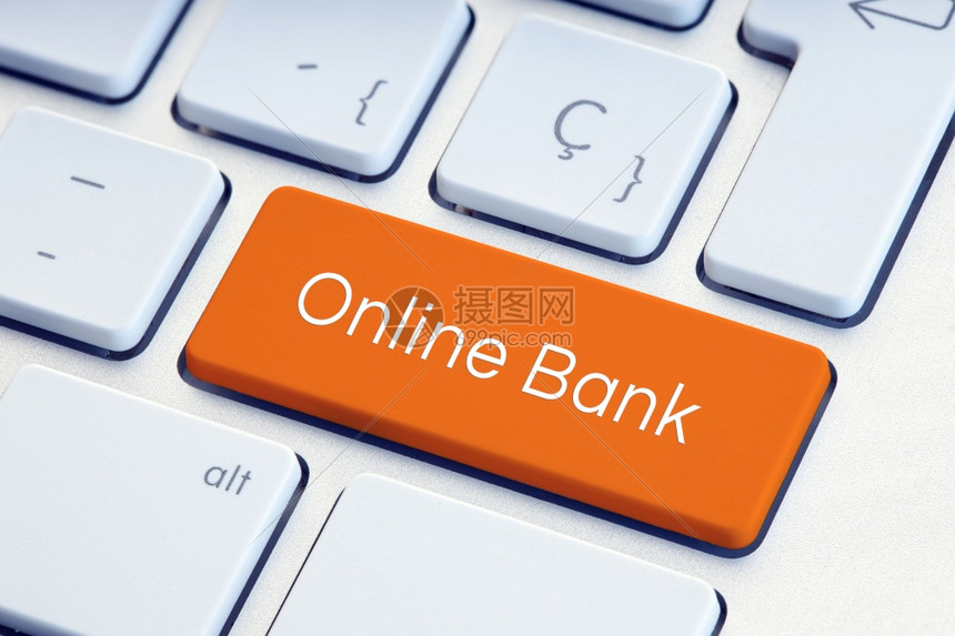 数字的银行业橙色键盘上的在线银行技术图片