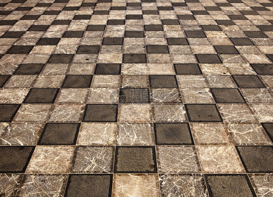 模式正方形在意大利西里Taormina的一个广场或公共上绘制了灰形大理石平方瓦的几何图案石头图片