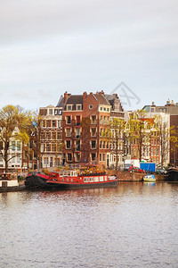 屋水反射荷兰阿姆斯特丹日出时的概览荷兰图片