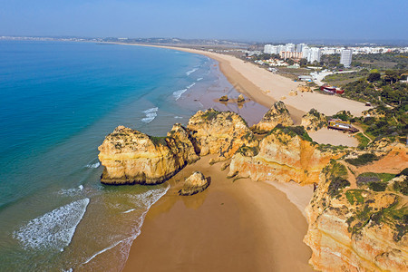 海洋从葡萄牙阿尔加夫的PraiaTresIrmaos建筑学酒店图片