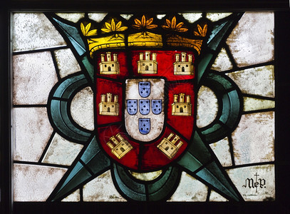 葡萄牙语1580年在西班牙塞戈维亚Alcazar画廊大厅的彩色玻璃和葡萄牙大衣亨利马图片