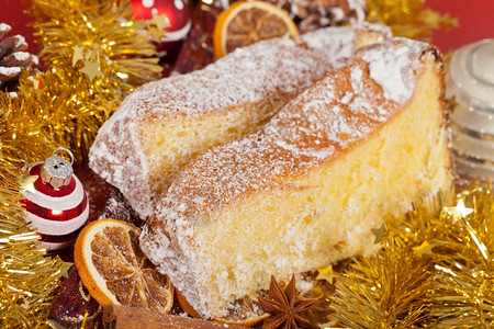 派对季节圣诞老人典型的意大利兰地潘多罗圣诞节日蛋糕图片