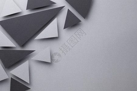 最佳灰色纸背景上具有黑色和灰三角形状的抽象背景最小样式复制空间顶视图黑色的抽象图片