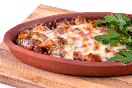 起司盘子肉切达干酪和蘑菇煮熟的炖饭美食图片