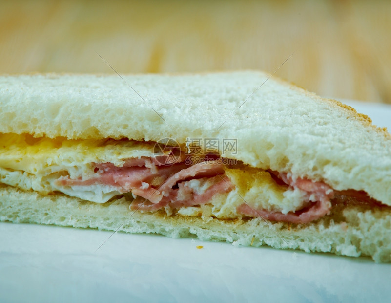 丹佛三明治由煎蛋饼组成由至少火腿洋葱绿辣椒和炒蛋组成点心食物摄影图片