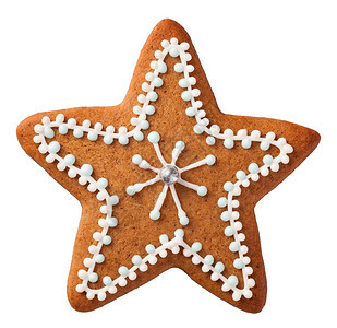 传统的星孤立在白色背景上的姜饼棕色图片