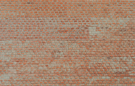风化红色的复古旧肮脏红砖墙面毛状旧脏砖墙图片