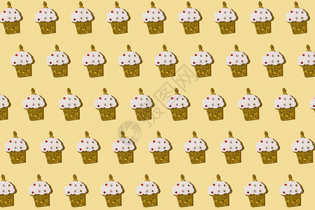 庆典巧克力黄色背景面的松饼重复模式墙纸图片
