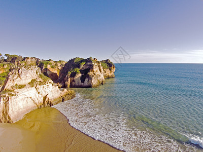 旅行在葡萄牙阿尔加夫的PraiatriesIrmaos海自然图片