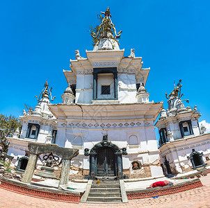 宗教的古老佛白色寺庙在尼泊尔松日Sunnyday佛教徒晴天图片