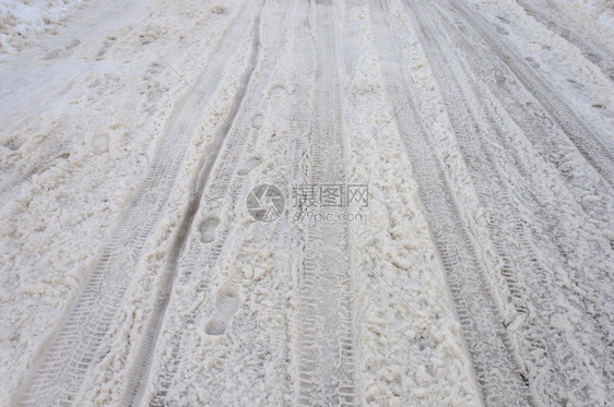 冬季日关闭积雪路背景漫步漂移追踪图片