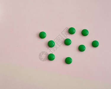绿色小药丸背景图片