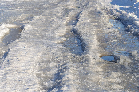 关闭冰盖道路背景冬季日霜节痕迹图片