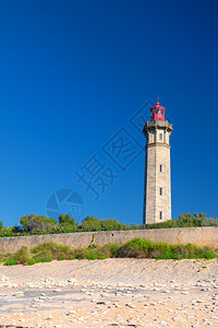 石头巴莱内斯放松IledeRe沿海的Baleines灯塔图片