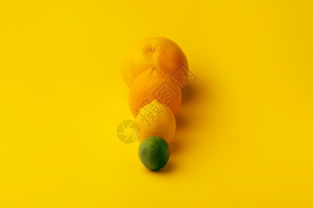 食物丰富多彩的不同黄本底柑橘橙柠檬和的多彩柑橘水果图片
