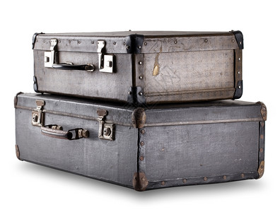 处理肮脏的老两个旧手提箱堆叠在白色背景上两个旧的手提箱图片