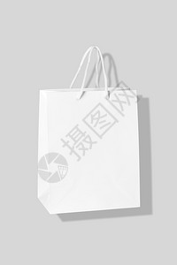 标签西班牙在灰色背景模拟版上孤立的纸购物袋零售图片