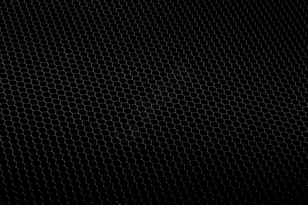 龋洞圆形的黑色金属质料底板钢背景材料蜂窝炙烤设计图片
