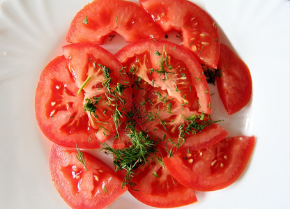熟番茄沙拉加瓜切片巨大的素食主义者餐具图片