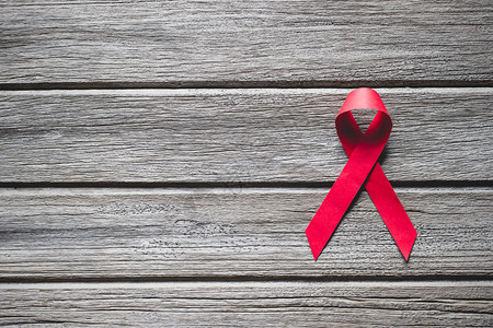 红色的斗争疾病世界艾滋日的纸丝带图片