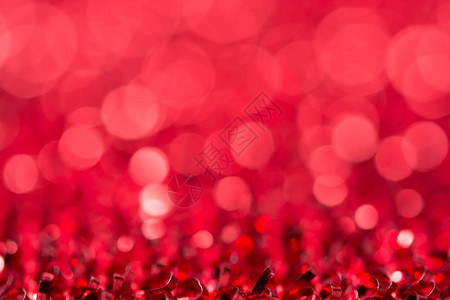 火花卡片热情红色bokoh节日的圣诞装饰背景图片