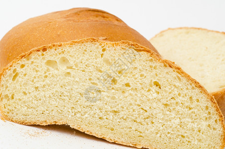 波德希瓦洛夫新鲜小麦面包和两轮宏观棕色的白图片