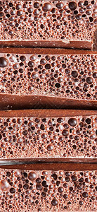 块堆栈多孔牛奶的背景黑巧克力多孔牛奶的背景黑巧克力抗氧化剂充气图片