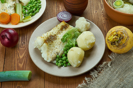 最佳食物诺斯克佩塞托尔传统鳕鱼盘挪威烹饪传统各种菜类顶视图图片